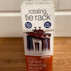 Richards lighted revolving tie rack, hold up to 64 ties, features belt hooks.